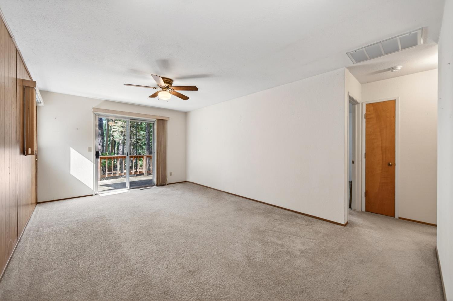 20191 Kit Court Volcano, CA 95689 - Photo 15 of 54 a view of a livingroom with a ceiling fan and window