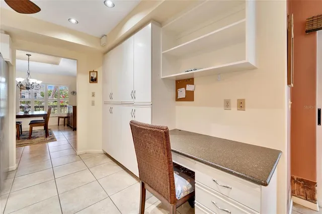 an aerial view of a house with outdoor space