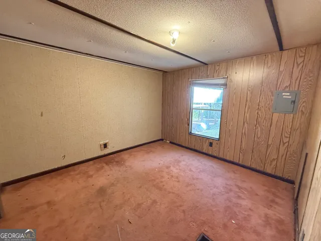 a view of a patio with wooden floor