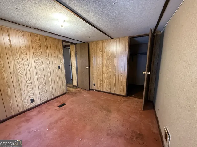 a view of a living room and hardwood floor