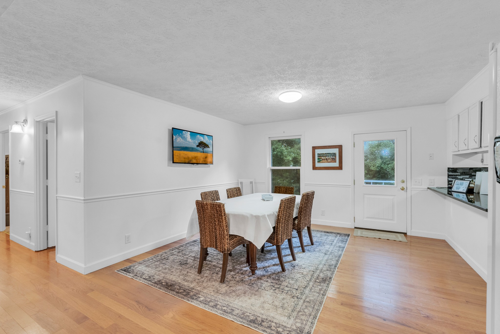 1389 Coconut Ridge Road Smithville, TN 37166 - Photo 16 of 39 a view of a dining room with furniture and wooden floor