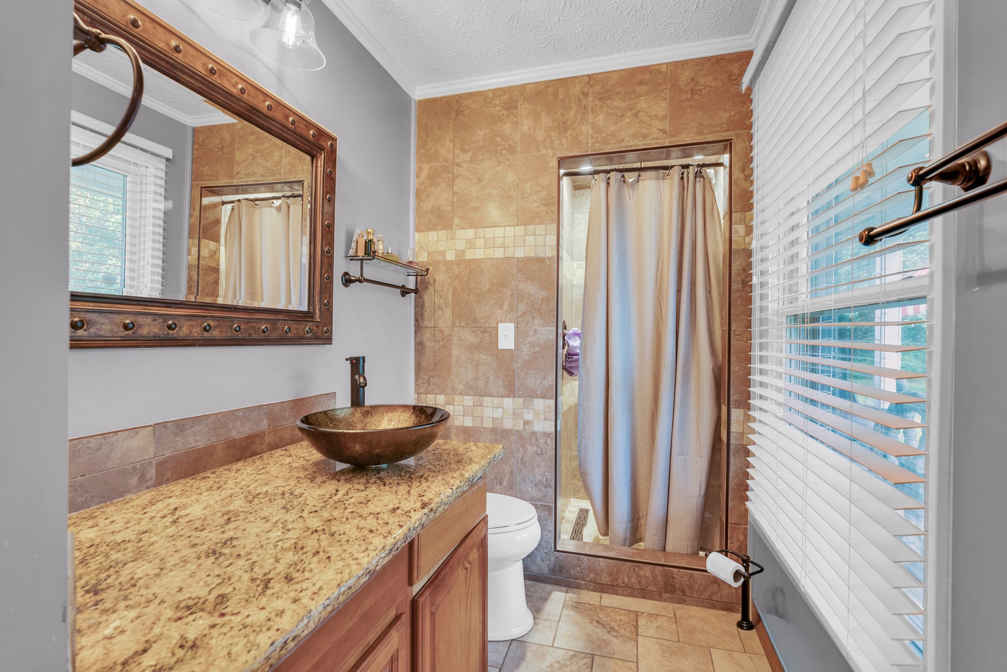 1389 Coconut Ridge Road Smithville, TN 37166 - Photo 22 of 39 a kitchen with a granite countertop sink and a refrigerator