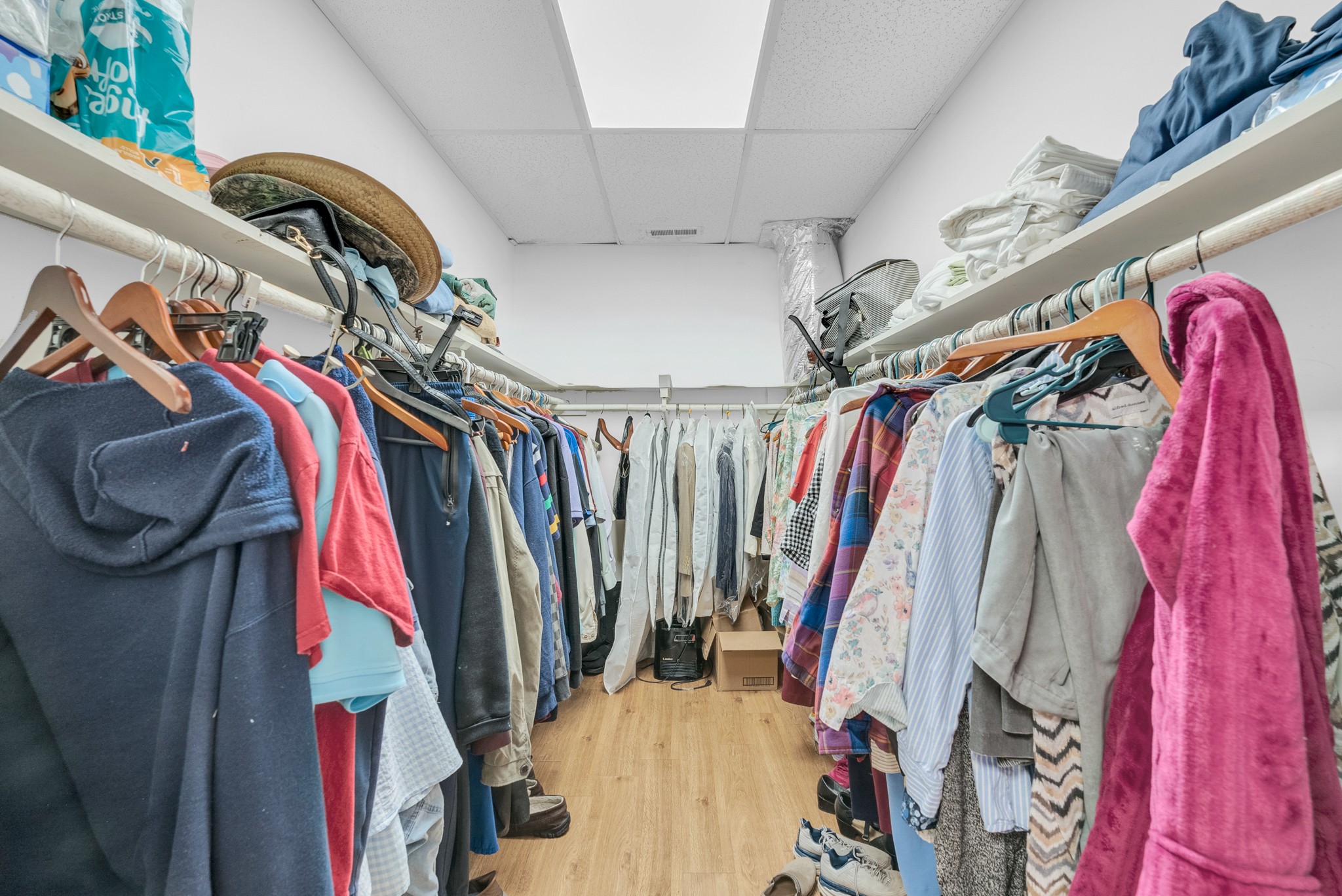 1389 Coconut Ridge Road Smithville, TN 37166 - Photo 33 of 39 a view of walk in closet with clothes and shoes