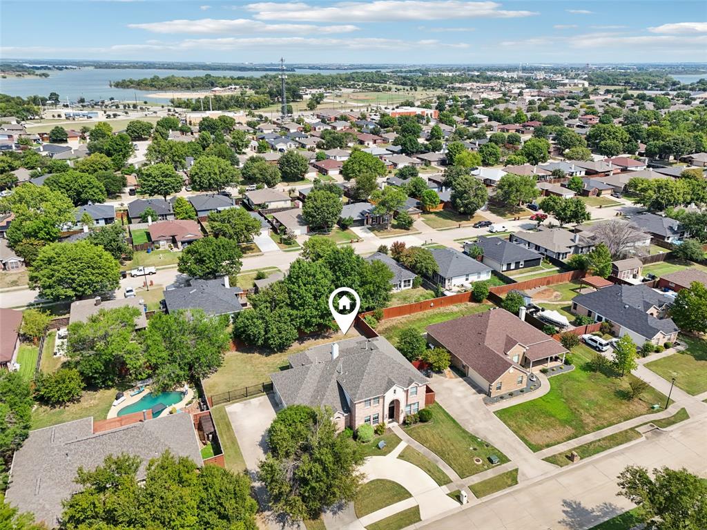 1321 Shell Beach Drive Little Elm, TX 75068 - Photo 2 of 40 an aerial view of residential houses with outdoor space