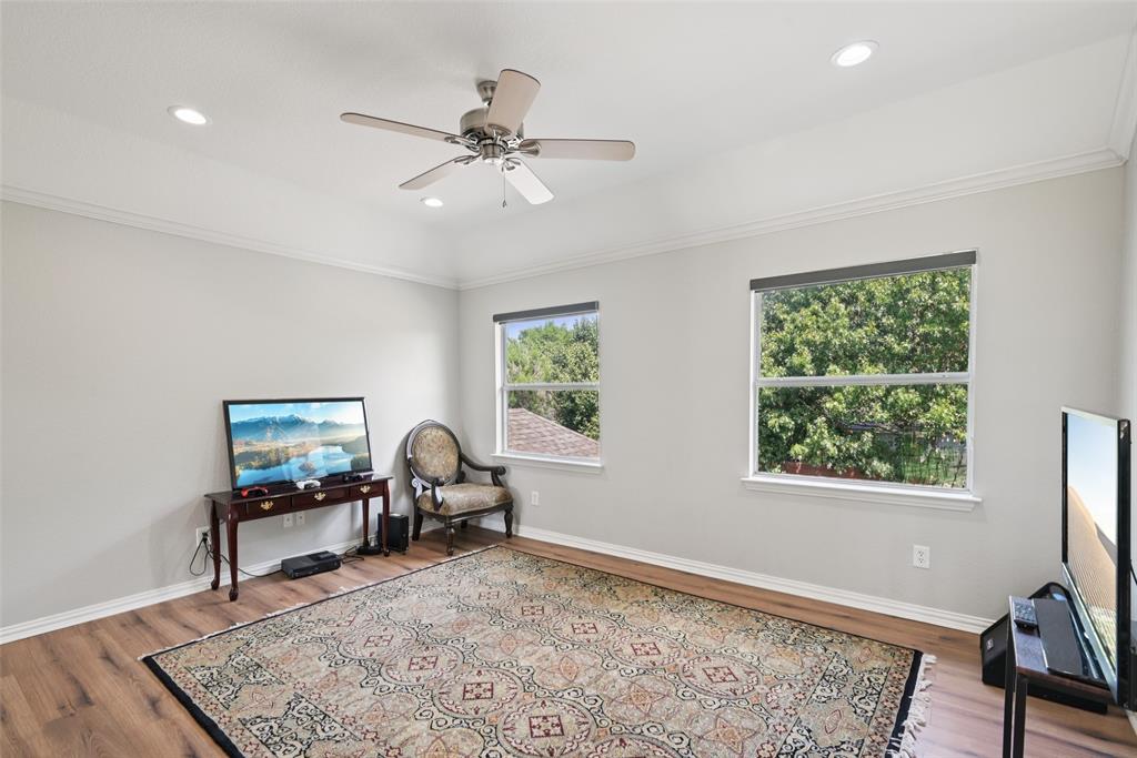 1321 Shell Beach Drive Little Elm, TX 75068 - Photo 24 of 40 a view of a workspace with furniture and a window