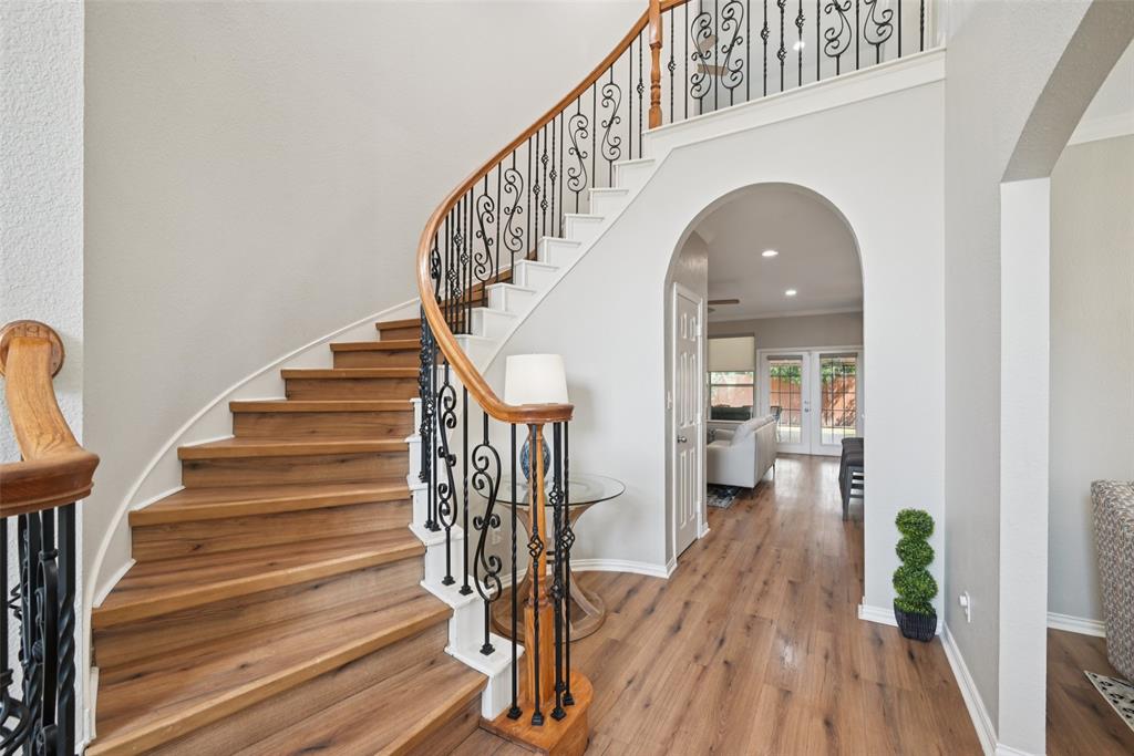 1321 Shell Beach Drive Little Elm, TX 75068 - Photo 5 of 40 a view of entryway and hall with wooden floor