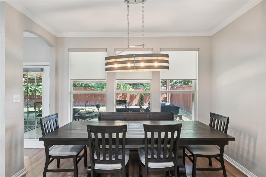 1321 Shell Beach Drive Little Elm, TX 75068 - Photo 10 of 40 a view of a dining room with furniture window and outside view