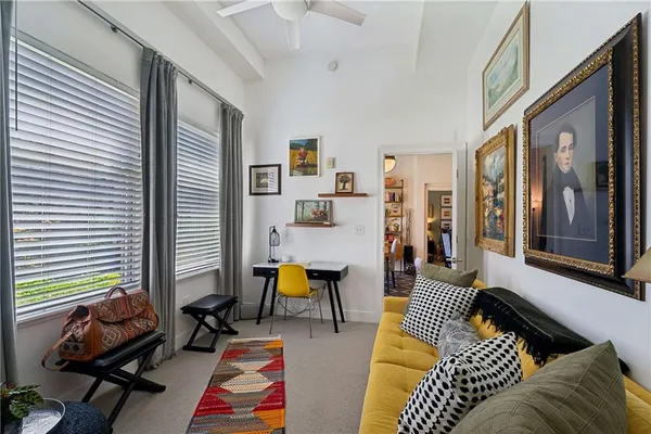 a living room with furniture and a window