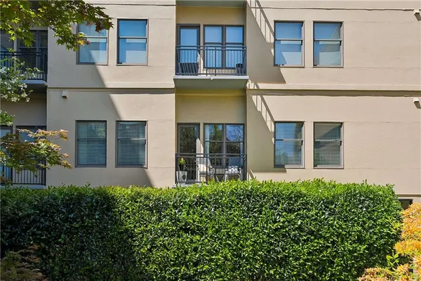a front view of a multi story residential apartment building