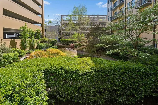a view of balcony with a potted plant