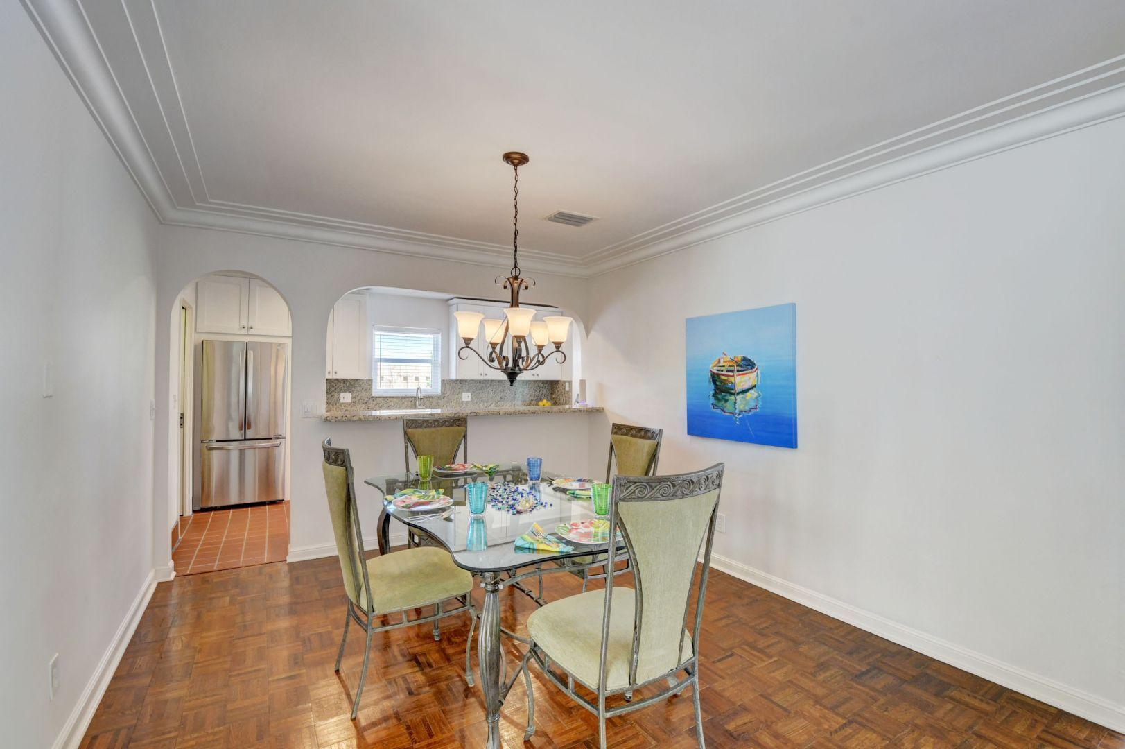 470 Northeast Spanish Trail Boca Raton, FL 33432 - Photo 8 of 42 DINING ROOM TO KITCHEN