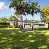a view of a house with a swimming pool