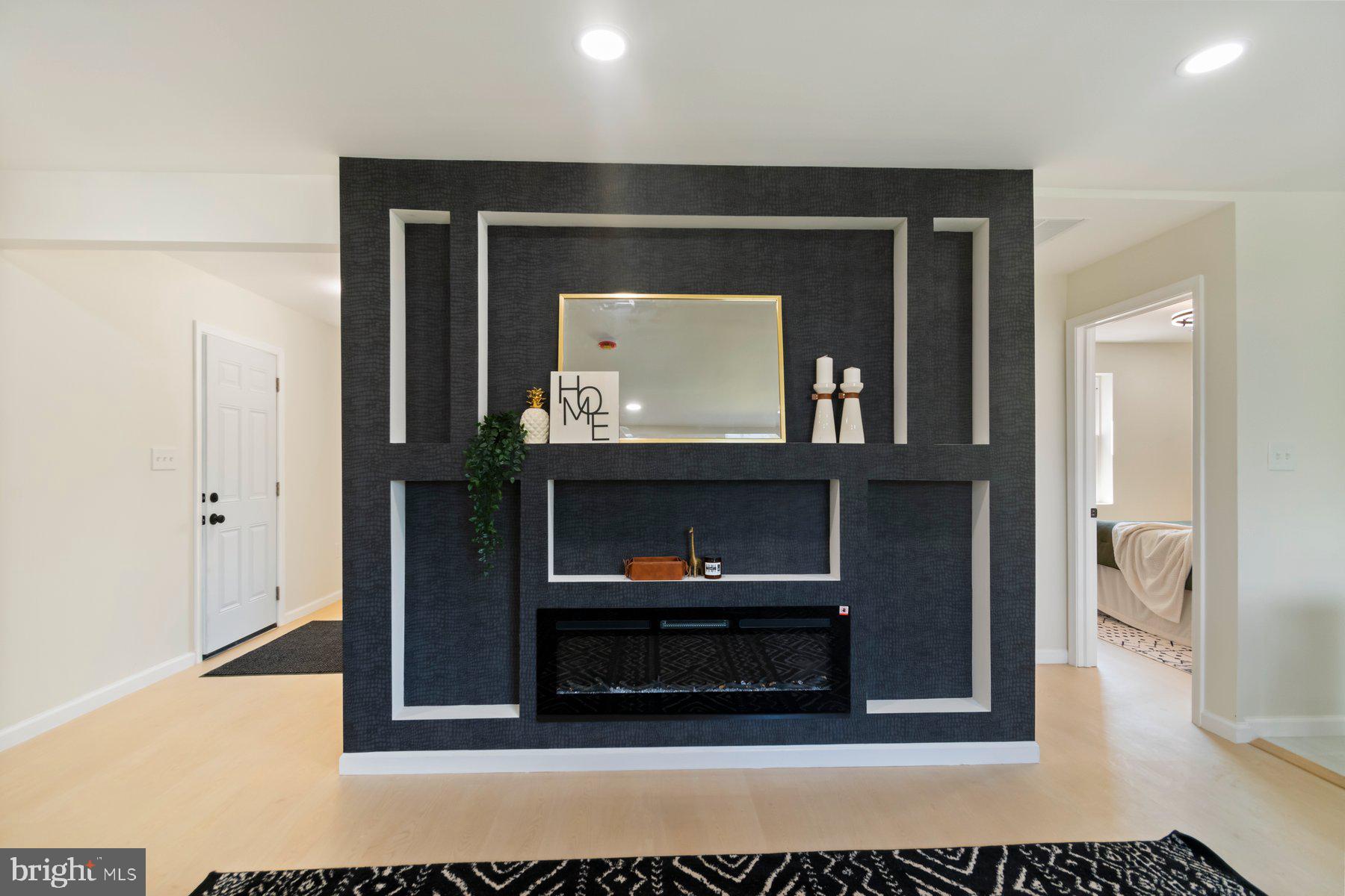 5302 The Alameda Baltimore, MD 21239 - Photo 11 of 36 a living room with furniture and a wooden floor