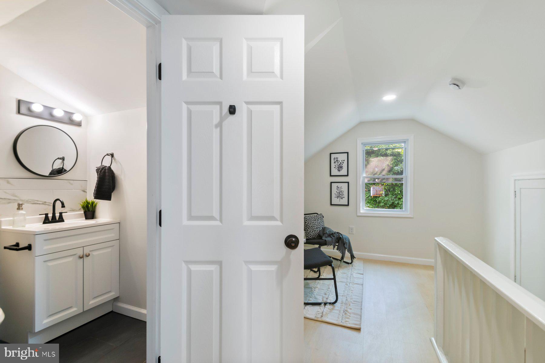 5302 The Alameda Baltimore, MD 21239 - Photo 20 of 36 a view of a bathroom with a sink dryer and washer