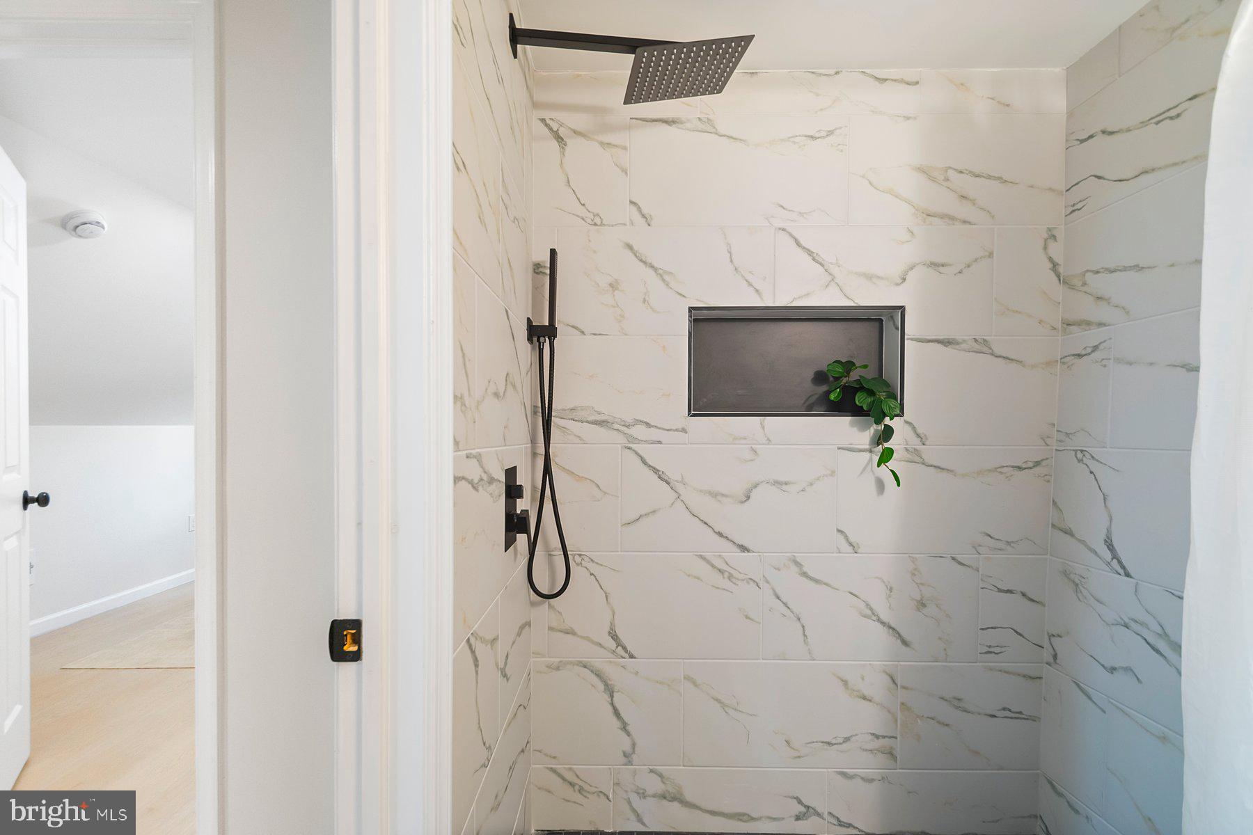 5302 The Alameda Baltimore, MD 21239 - Photo 21 of 36 a bathroom with a shower