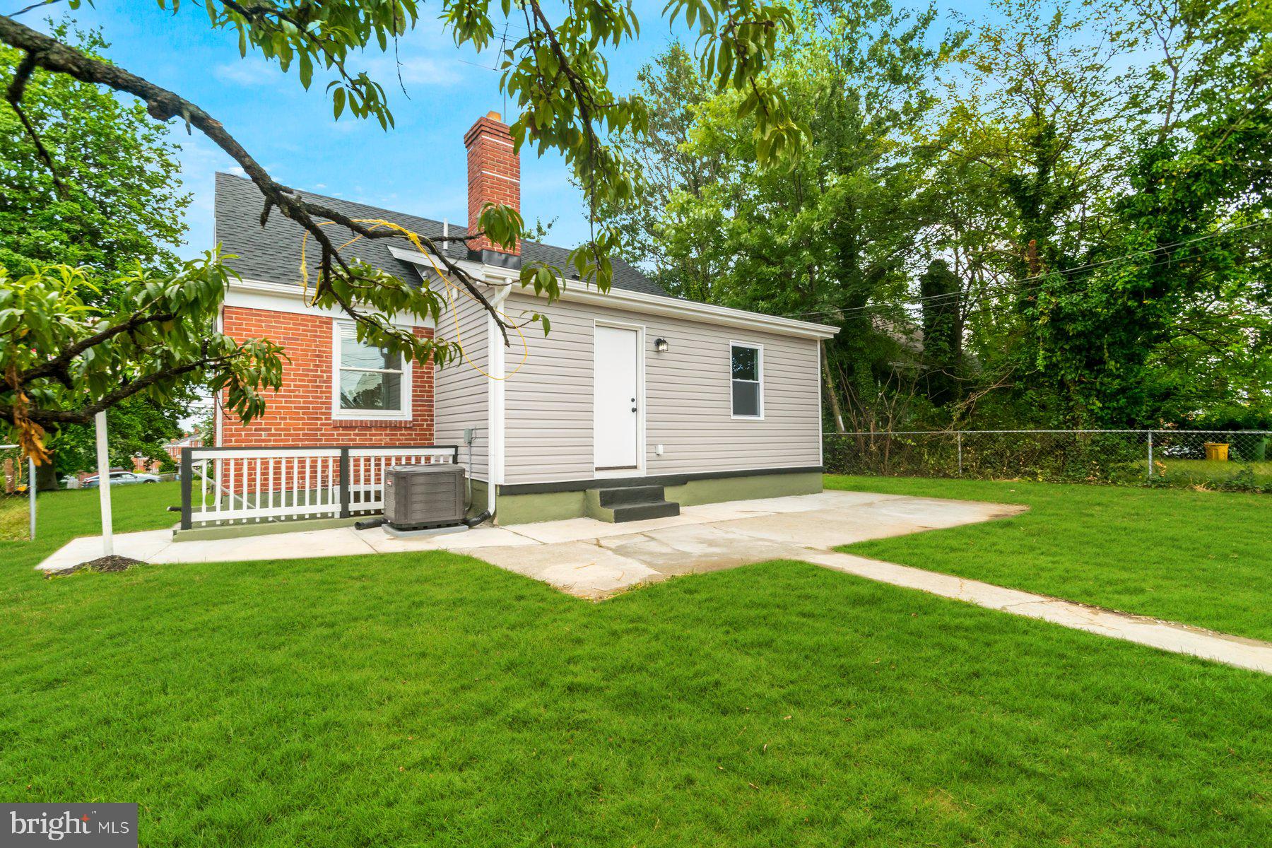 5302 The Alameda Baltimore, MD 21239 - Photo 31 of 36 a house view with a sitting space and garden