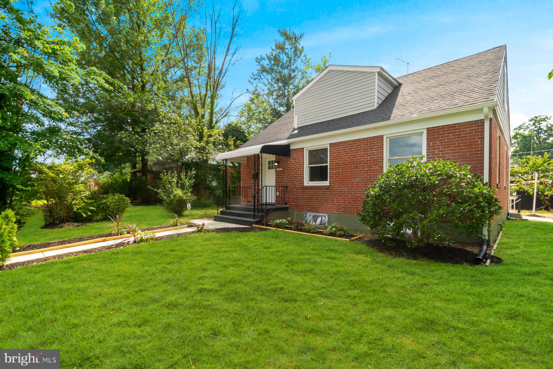 5302 The Alameda Baltimore, MD 21239 - Photo 32 of 36 a view of a house with a backyard