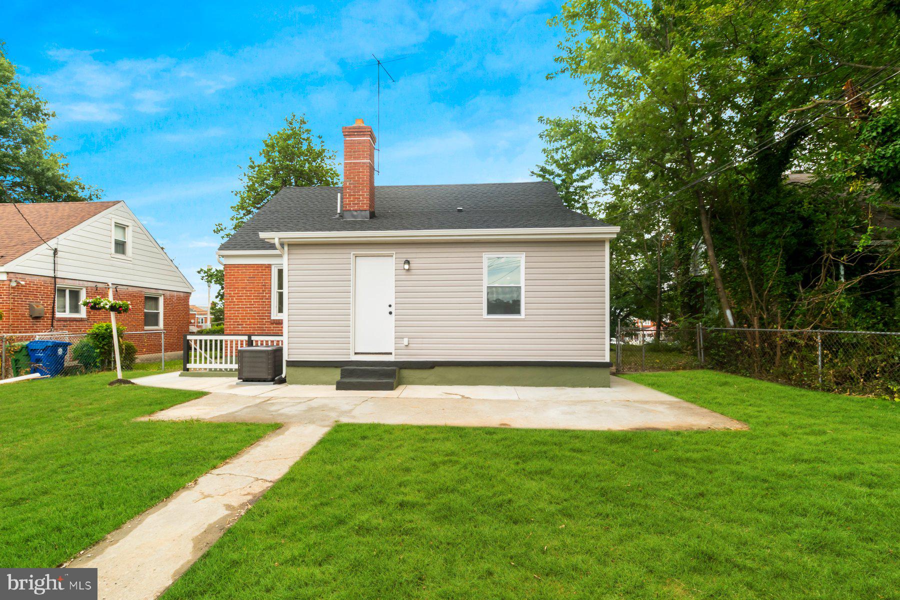 5302 The Alameda Baltimore, MD 21239 - Photo 36 of 36 a view of a yard with a house