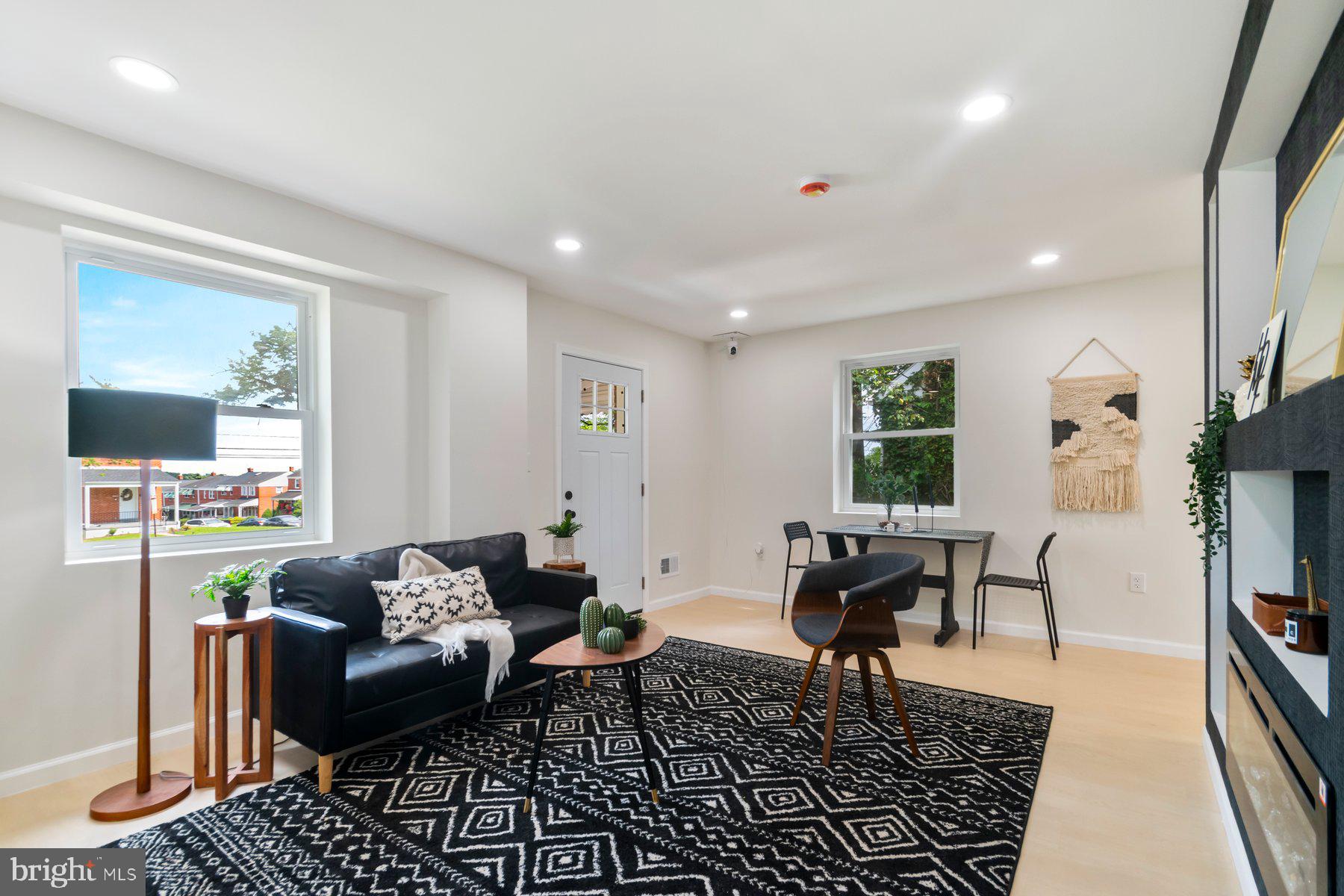 5302 The Alameda Baltimore, MD 21239 - Photo 5 of 36 a living room with furniture and a couch