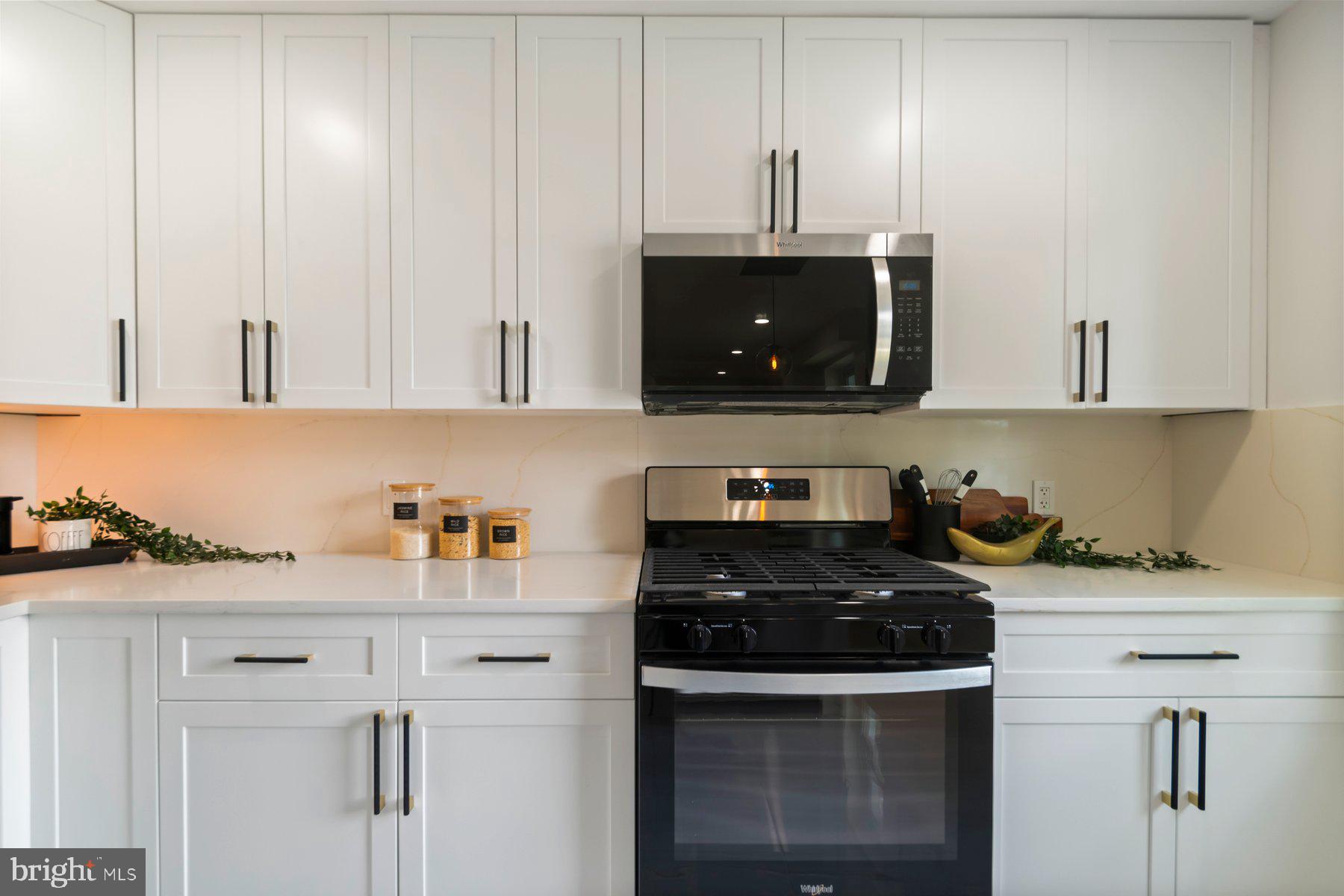 5302 The Alameda Baltimore, MD 21239 - Photo 9 of 36 a kitchen with a sink and cabinets