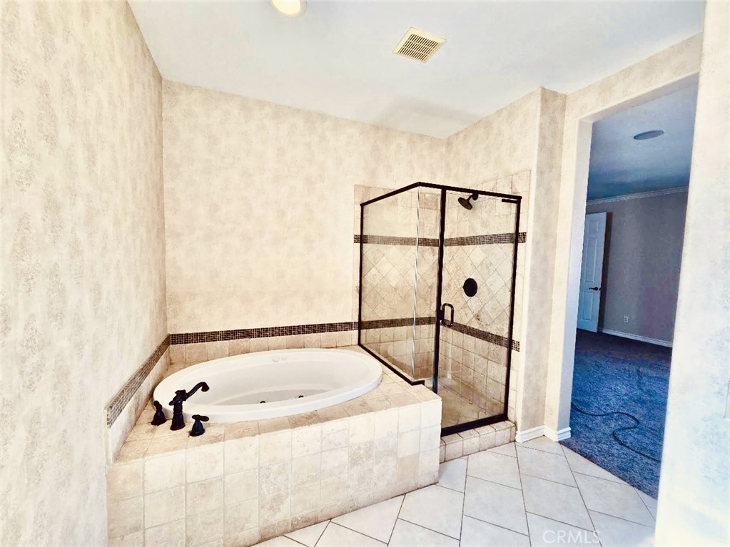 4512 Luigl Court Riverside, CA 92501 - Photo 9 of 15 Master shower & tub