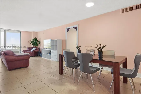 a view of a livingroom with furniture and window
