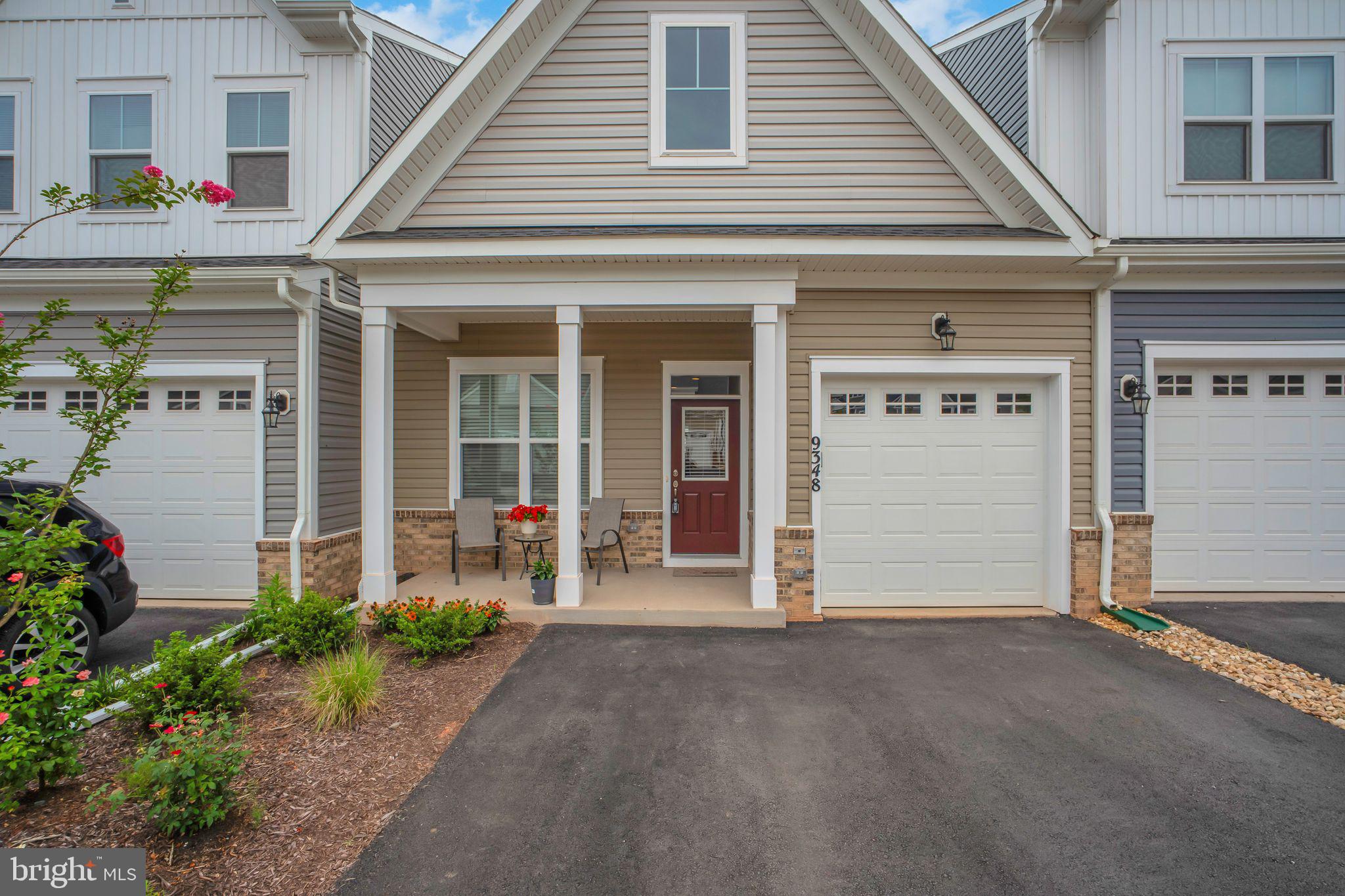 9348 Crestview Rdg Drive Bristow, VA 20136 - Photo 1 of 29 a view of a house with porch