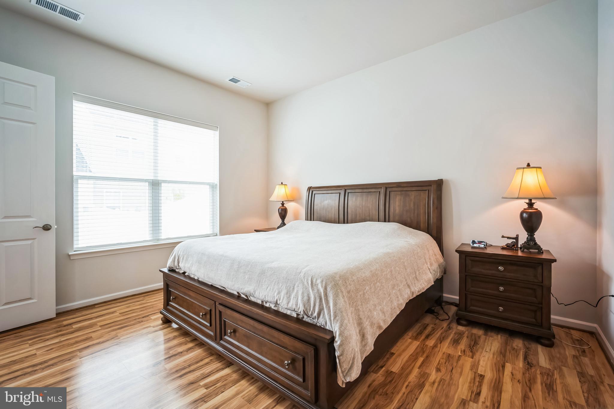 9348 Crestview Rdg Drive Bristow, VA 20136 - Photo 14 of 29 a bedroom with a bed and a window