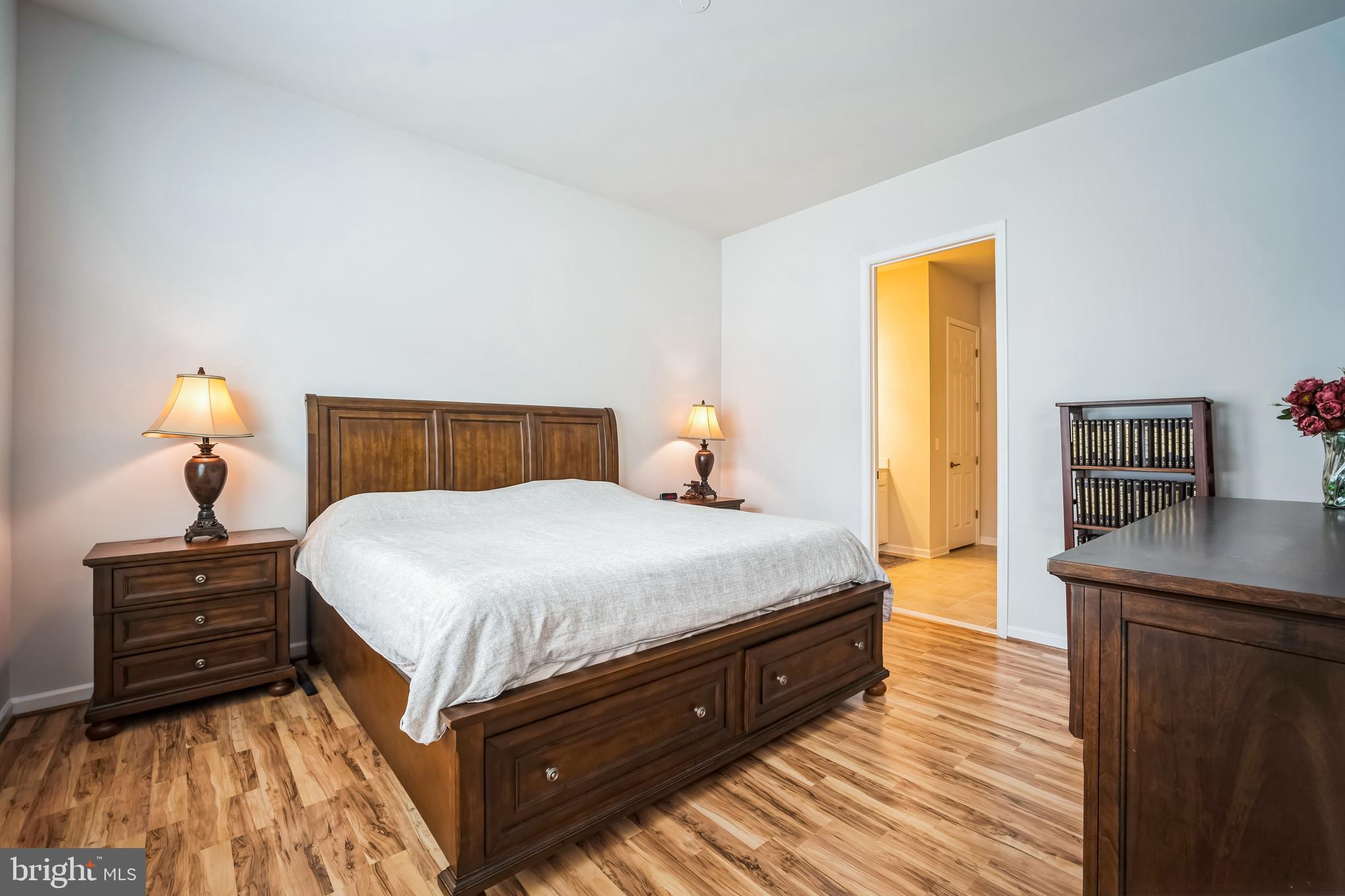 9348 Crestview Rdg Drive Bristow, VA 20136 - Photo 15 of 29 a bedroom with a bed and a dresser