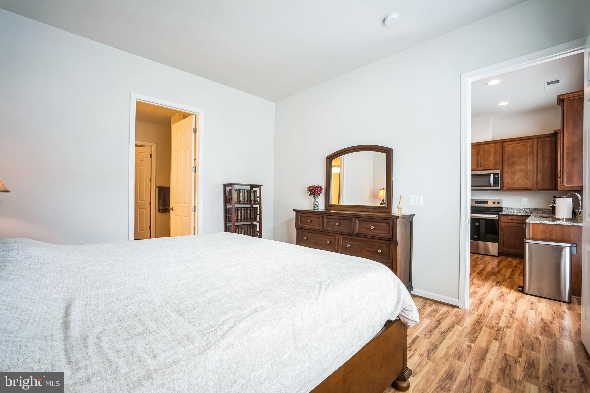 9348 Crestview Rdg Drive Bristow, VA 20136 - Photo 17 of 29 a bedroom with a bed and a flat screen tv
