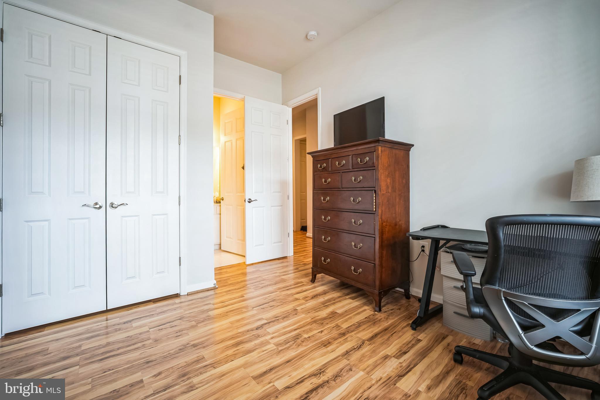9348 Crestview Rdg Drive Bristow, VA 20136 - Photo 23 of 29 a view of a workspace with furniture and wooden floor