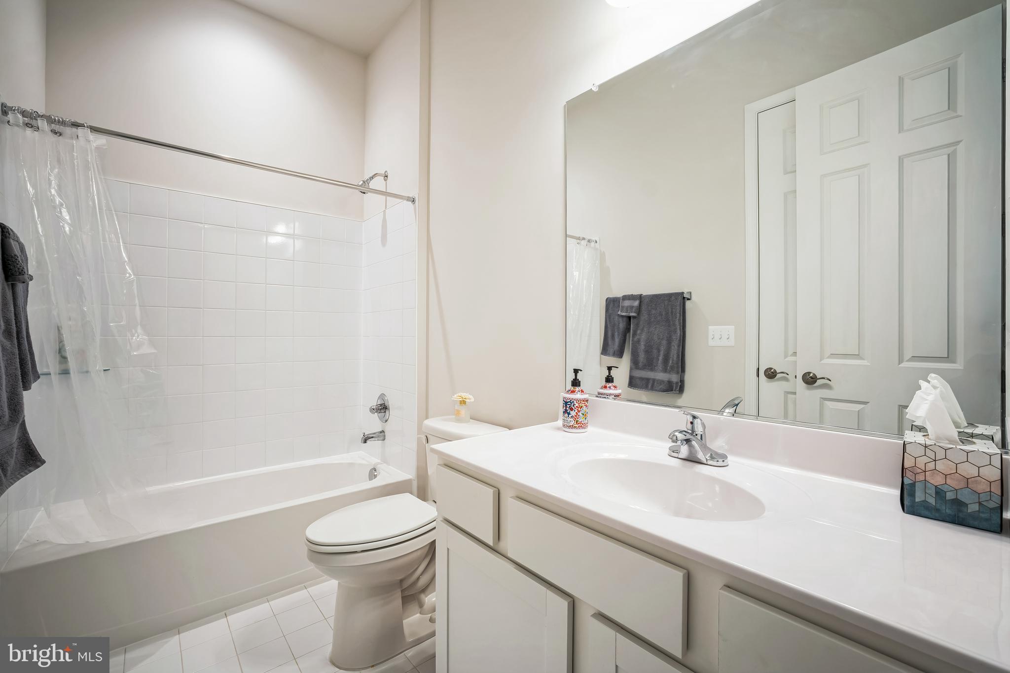 9348 Crestview Rdg Drive Bristow, VA 20136 - Photo 24 of 29 a bathroom with a sink a toilet and shower
