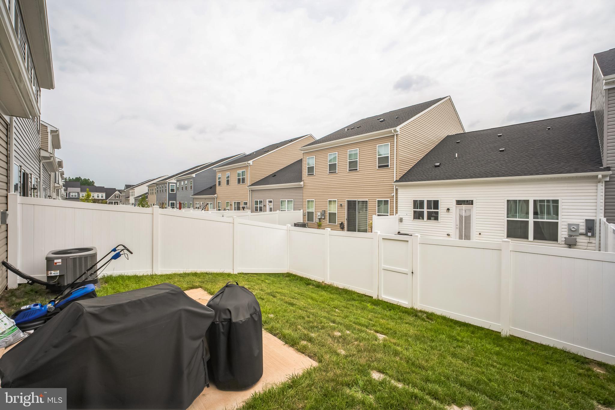 9348 Crestview Rdg Drive Bristow, VA 20136 - Photo 29 of 29 a house view with a backyard space