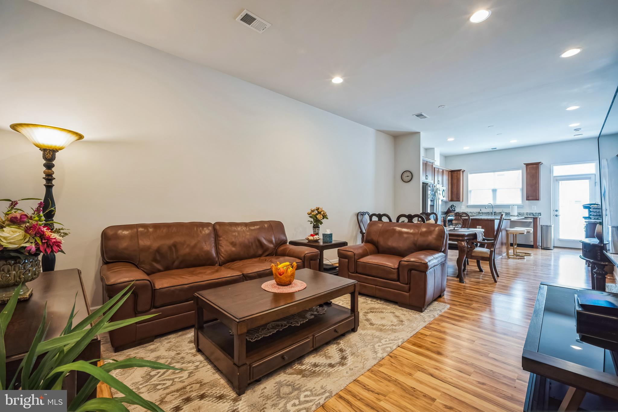 9348 Crestview Rdg Drive Bristow, VA 20136 - Photo 4 of 29 a living room with furniture and wooden floor