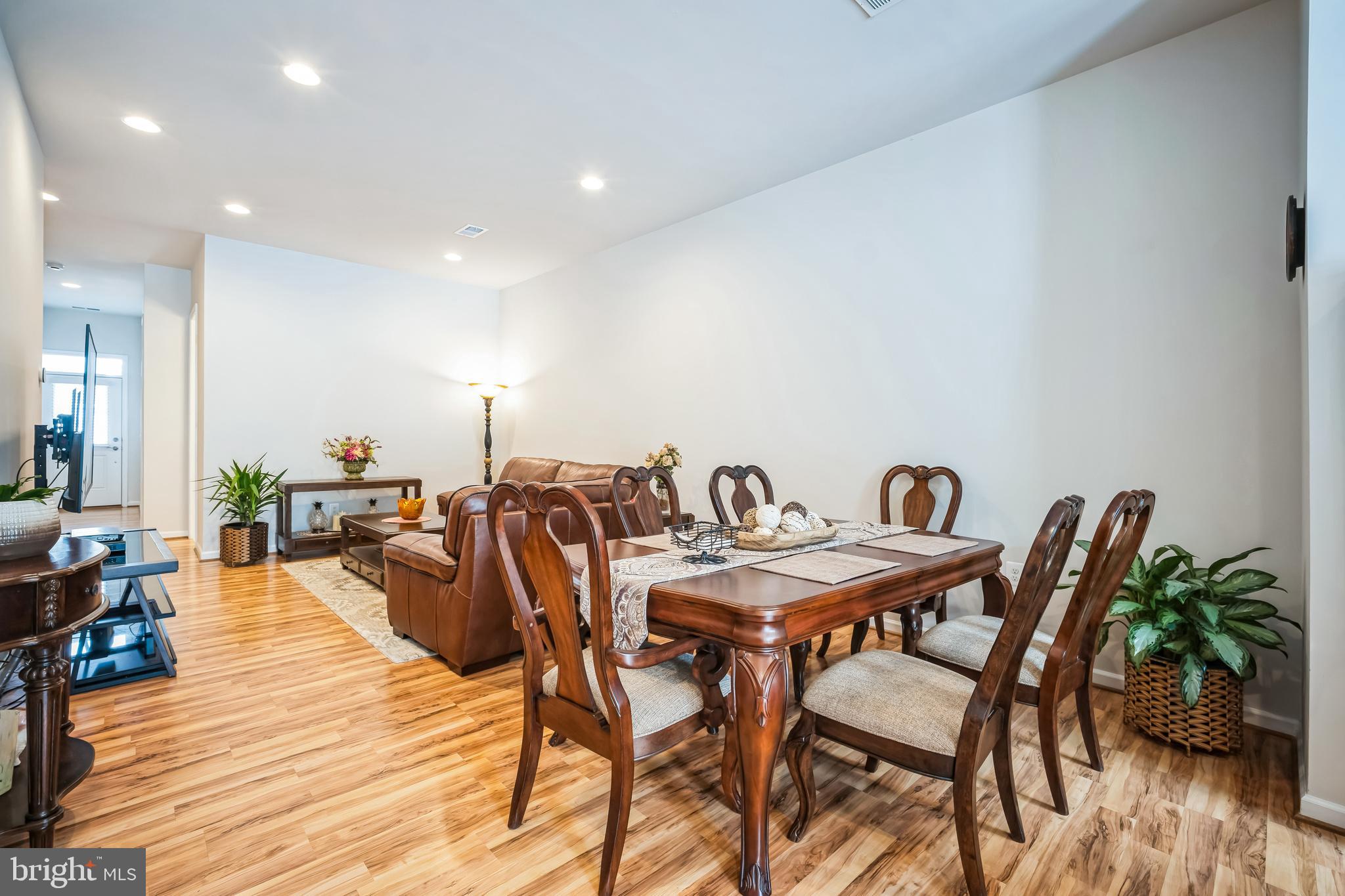 9348 Crestview Rdg Drive Bristow, VA 20136 - Photo 7 of 29 a view of a dining room with furniture and wooden floor