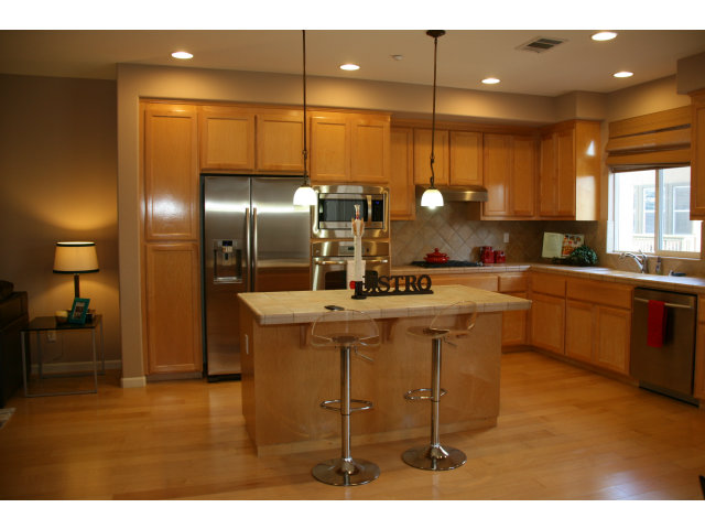 10027 Albion Road San Ramon, CA 94582 - Photo 1 of 17 a kitchen with cabinets a sink and appliances