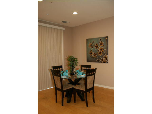 10027 Albion Road San Ramon, CA 94582 - Photo 13 of 17 a view of a dining room with furniture and a potted plant