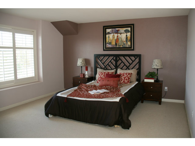 10027 Albion Road San Ramon, CA 94582 - Photo 4 of 17 a bed sitting in a bedroom next to a window