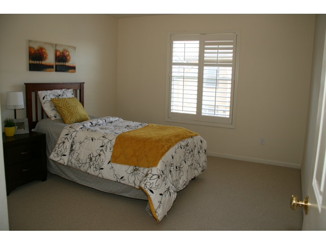 10027 Albion Road San Ramon, CA 94582 - Photo 6 of 17 a bedroom with a bed and window