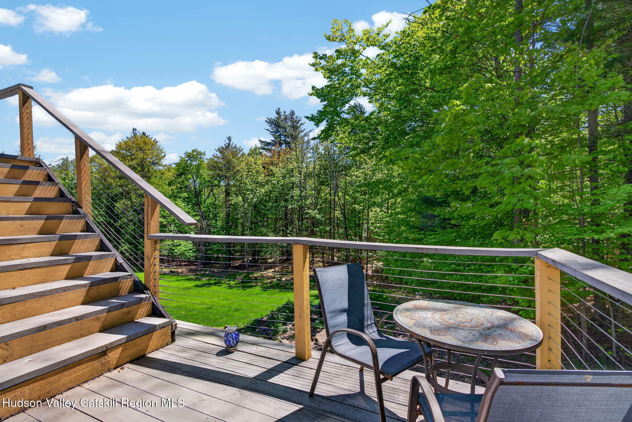 322 Morrison Road Acra, NY 12405 - Photo 32 of 49 a view of a chair and tables on the roof deck