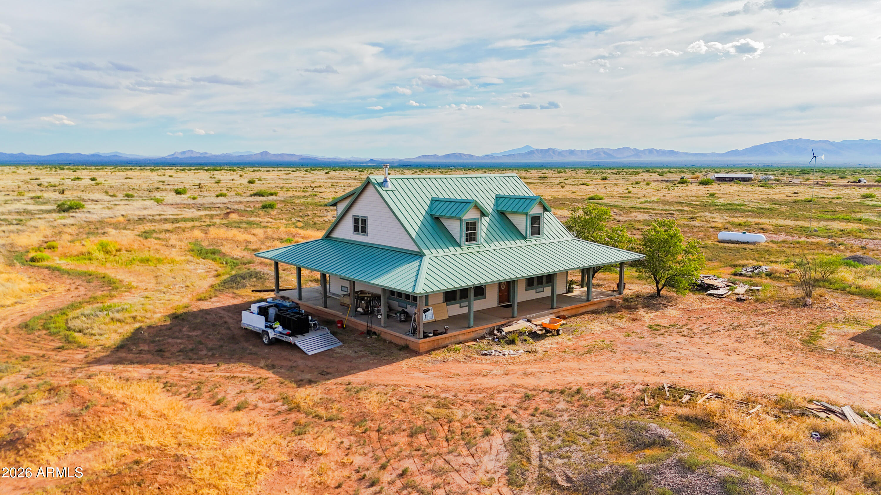 3429 West Markel Road Douglas, AZ 85607 - Photo 3 of 47 a view of a swimming pool with an ocean beach