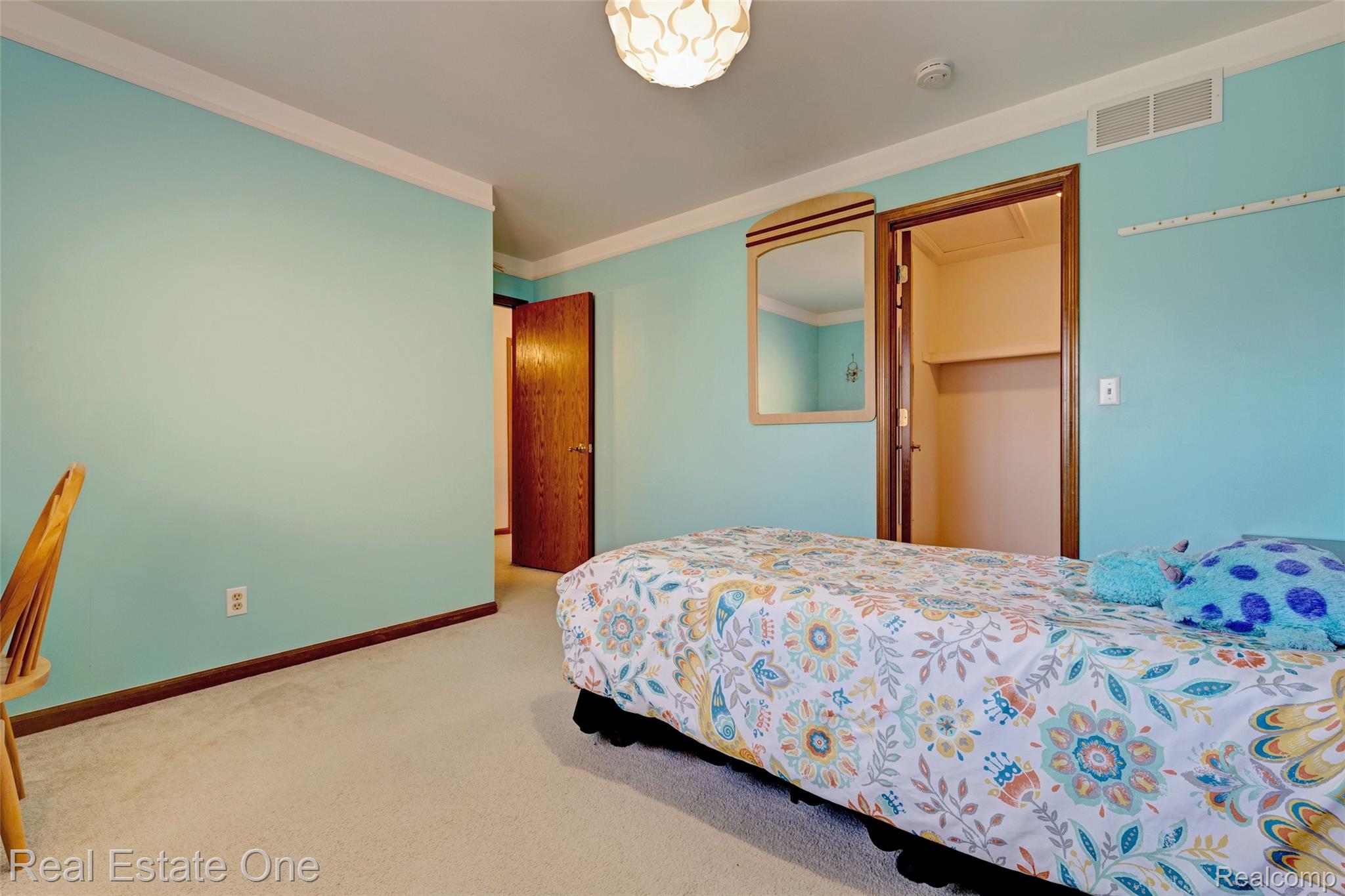 6400 Oakhill Road Ortonville, MI 48462 - Photo 40 of 82 Bedroom featuring light carpet and crown molding