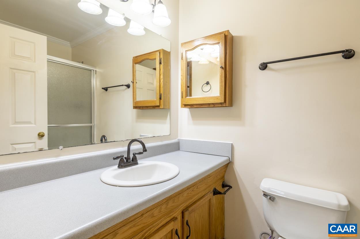 32 Begum Road Palmyra, VA 22963 - Photo 14 of 23 a bathroom with a sink and a mirror
