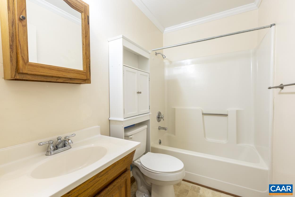 32 Begum Road Palmyra, VA 22963 - Photo 18 of 23 a bathroom with a sink toilet and shower