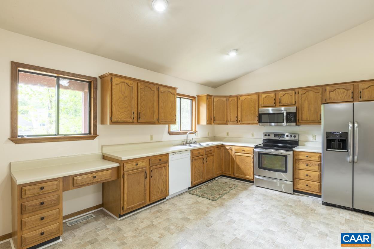 32 Begum Road Palmyra, VA 22963 - Photo 3 of 23 a kitchen with a sink stove and refrigerator