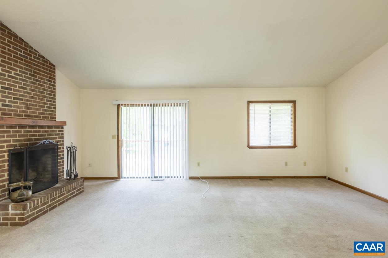32 Begum Road Palmyra, VA 22963 - Photo 7 of 23 an empty room with windows and fireplace