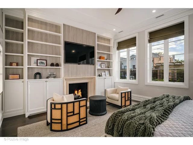 a bathroom with a granite countertop sink a mirror and shower