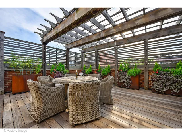 a view of a balcony with chairs