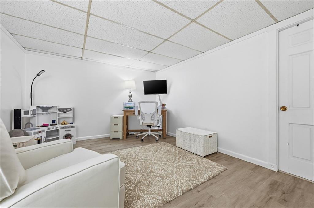 129 Meadowbrook Road Renfrew, PA 16053 - Photo 21 of 45 a living room with furniture and a flat screen tv