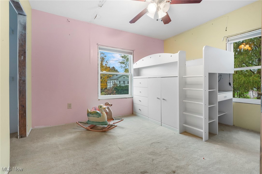 6453 Waterloo Road Atwater, OH 44201 - Photo 20 of 24 Unfurnished bedroom with carpet floors and a ceiling fan